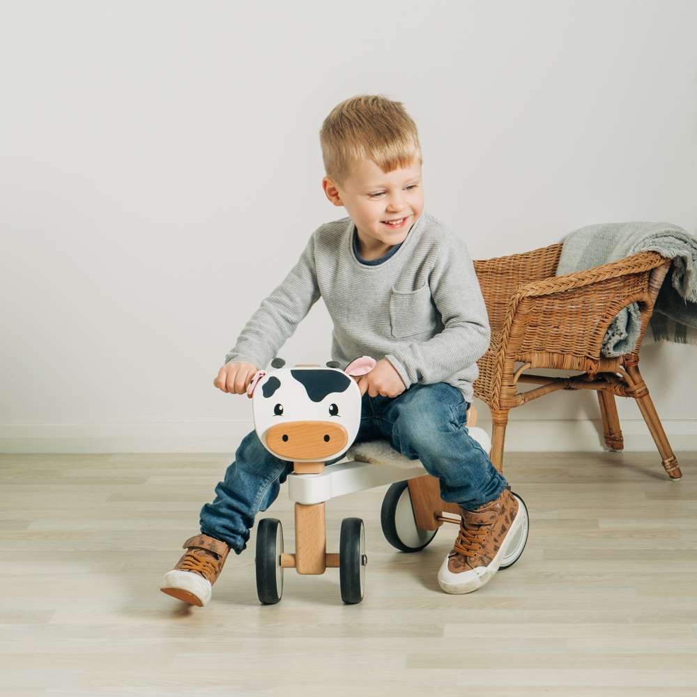 Bigjigs Toys Wooden Ride On Cow Toddler Push Along Toy with Fluffy Seat 18 Months Plus